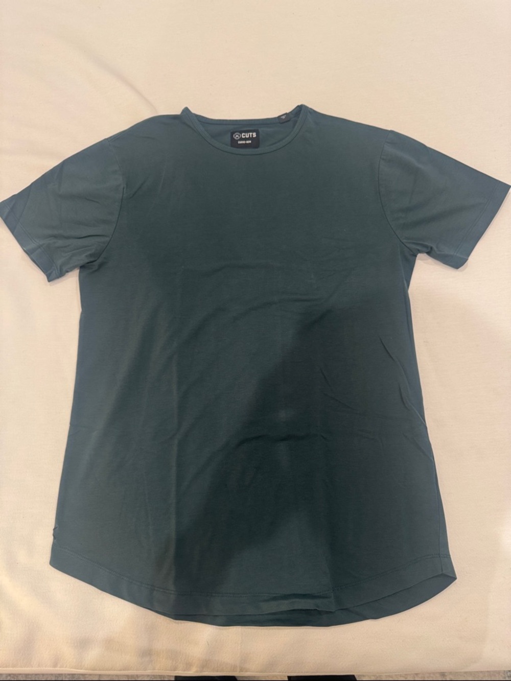 Cuts Clothing Men's T-Shirt in Forest Green Curved Hem